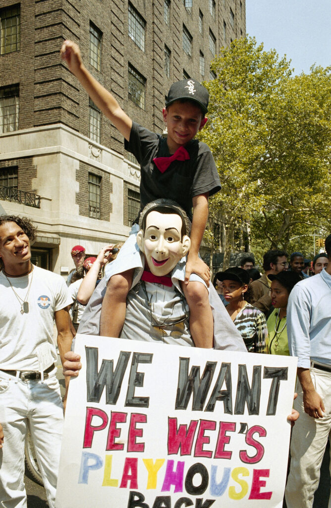 Fans of Peewee Herman protest after his arrest.